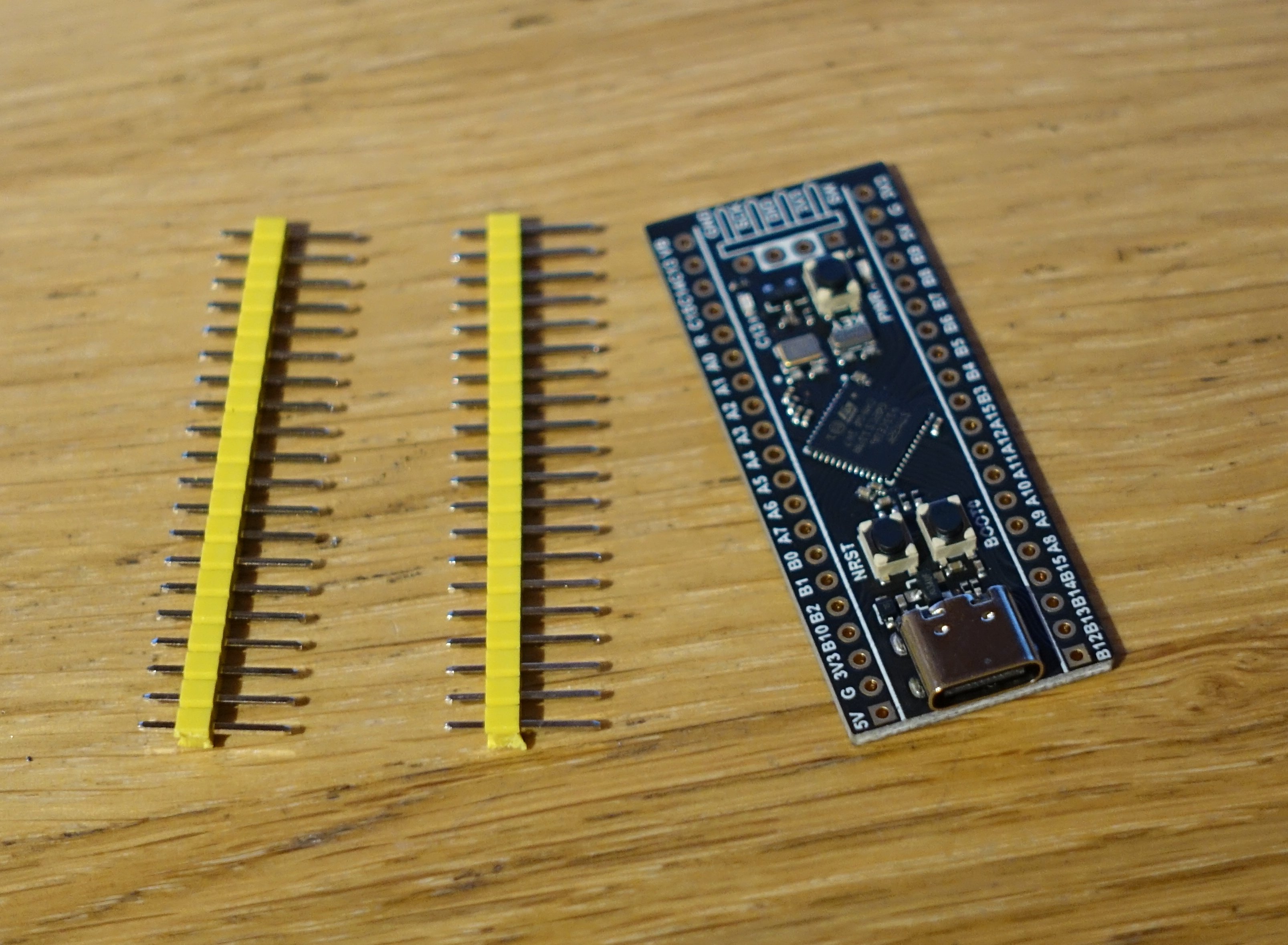 A MCU board with headers to solder to it