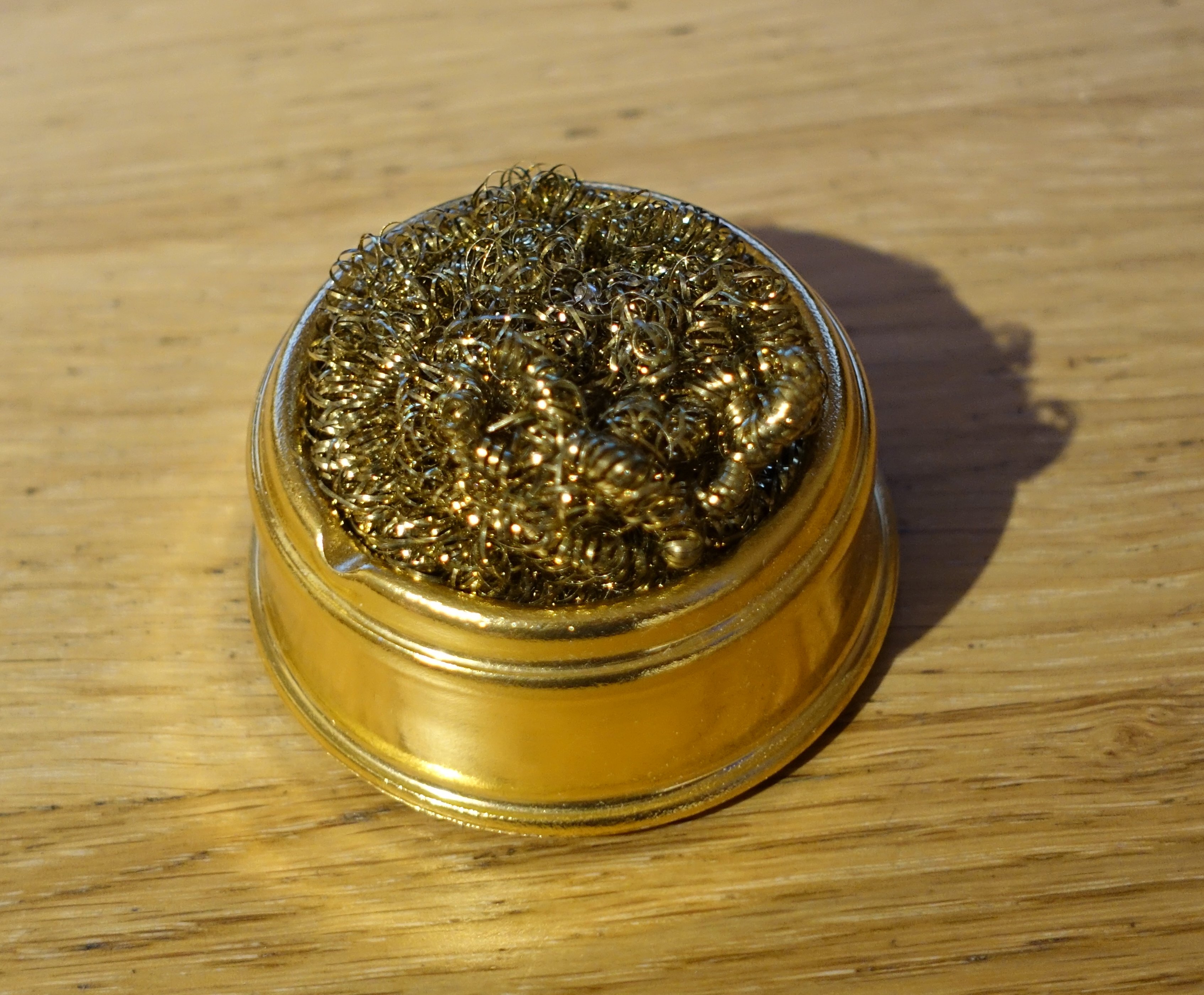 An image of a container of brass wool
