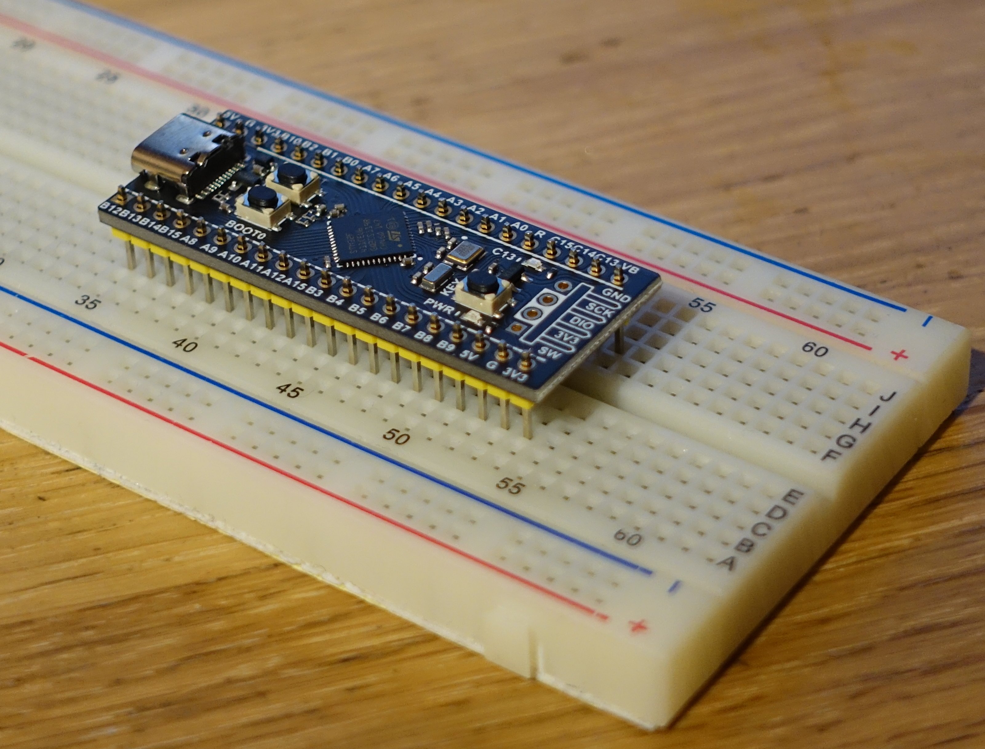 A MCU board on a breadboard to keep the headers in place